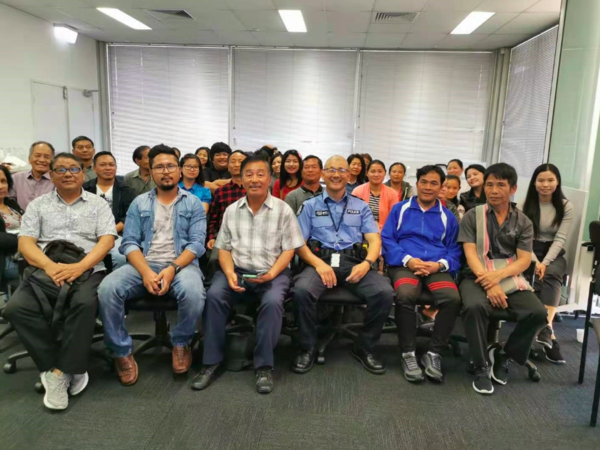 Sam Lim with a number of multicultural community group members.