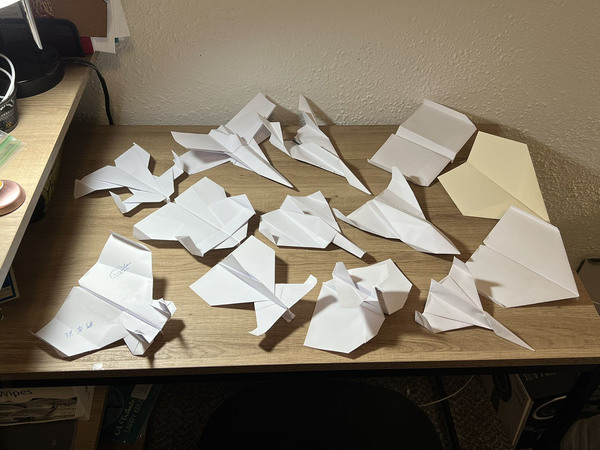 Chee's many other paper plane designs.