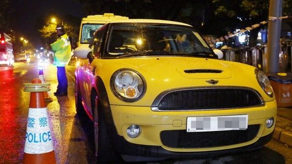 The victims had been found unconscious in their yellow Mini Cooper.