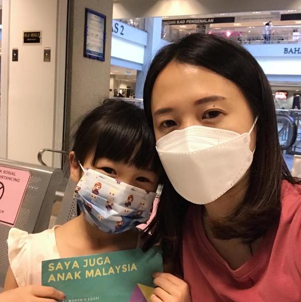 Esther Teo with her daughter.