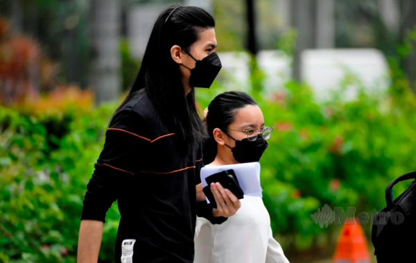 Amira with her husband outside the court on Tuesday, 5 July.