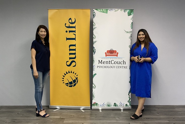 Sun Life Malaysia's Head of Brands And Communications, Tricia Loh (left) posing with MentCouch's Founder and CEO, Tanjina Ashraf Khan (right)