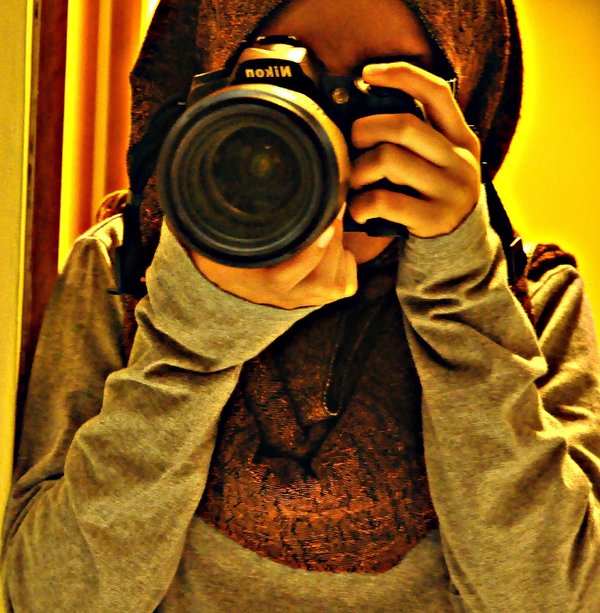 Me, attempting Hana Tajima's mirror selfie. Even a high-definition photo from a DSLR camera can't save this photo from the impact of a high contrast filter.