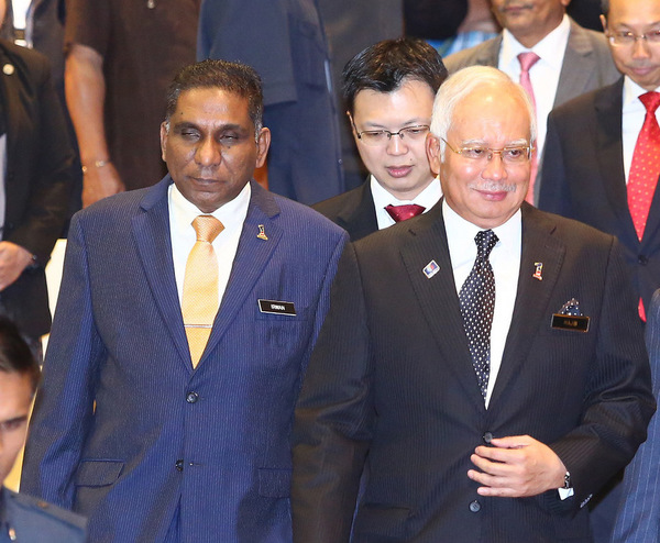 Former Treasury secretary-general Mohd Irwan Serigar Abdullah (left) and Datuk Seri Najib Razak (right).