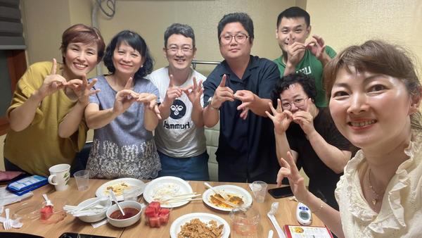 Lim with sign language interpreters from South Korea.