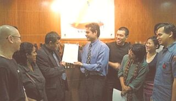 Pang (fourth from the right) and Toni Kasim (second from the left), among other writers, responding to SUHAKAM.