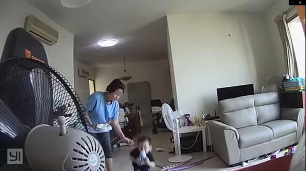 The CCTV footage captured the moment Wen's son fell and injured his face.