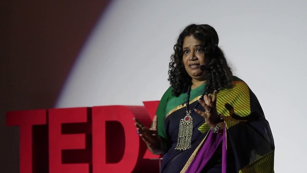 Mahi giving a TEDx talk about the hidden forms of human trafficking.