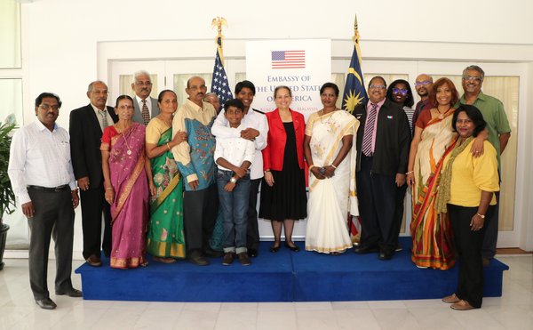 Janushaa and her family at her induction ceremony in 2018.