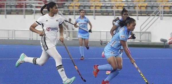 Kirandeep Kaur (left, in white) during the Five-Test Series against India at the National Hockey Stadium in Bukit Jalil.