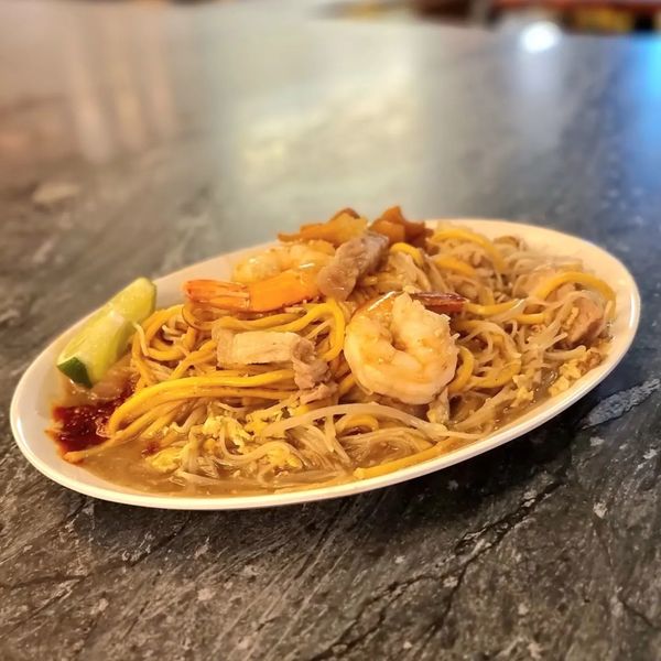 A bowl of prawn noodles from Prawnaholic Collections NYC.