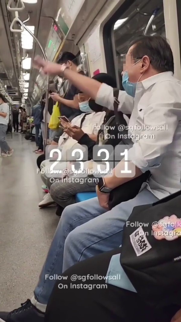 The Singaporean man yelling at the row of passengers who sat at the reserved seats in the MRT.