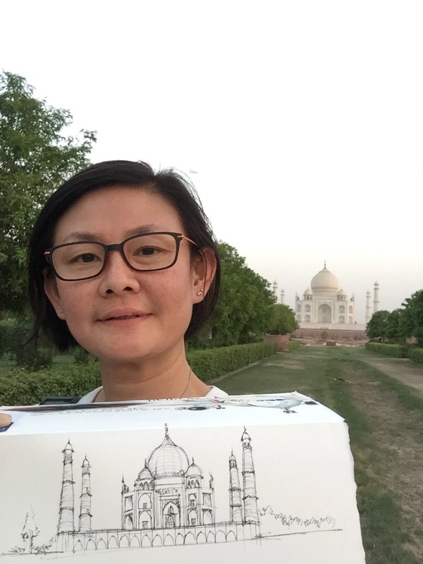 Simpson with her sketch of one of the seven wonders of the world, the Taj Mahal.