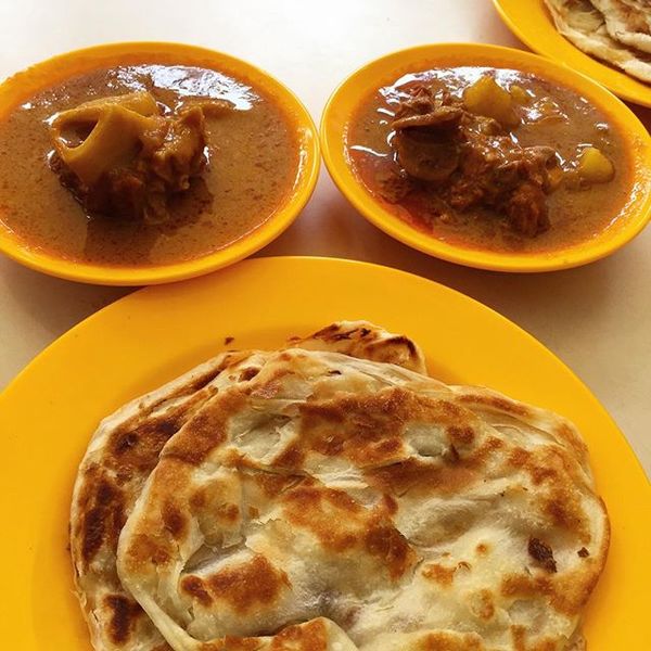 Roi prata with a side of mutton curry.