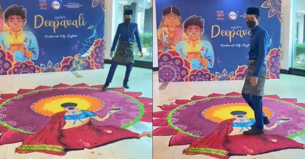 Screenshot of the viral video showing the hospital staff member dececrating the kolam.