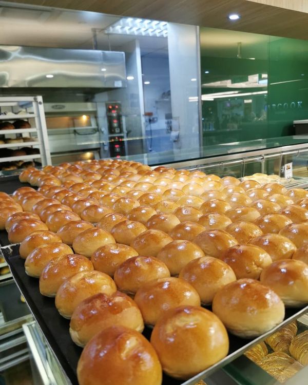 Fluffy pumpkin-filled mini buns by Barcook Bakery.