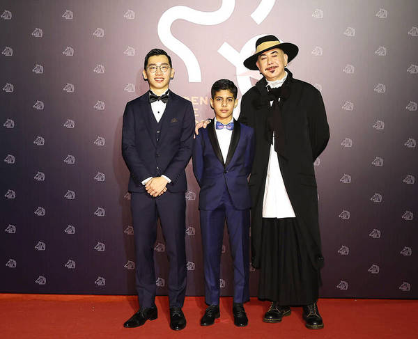 Director Lau Kok Rui (left) with 'The Sunny Side of the Street' cast members, Sahal Zaman (middle) and Anthony Wong (right) at the Golden Horse Awards red carpet.