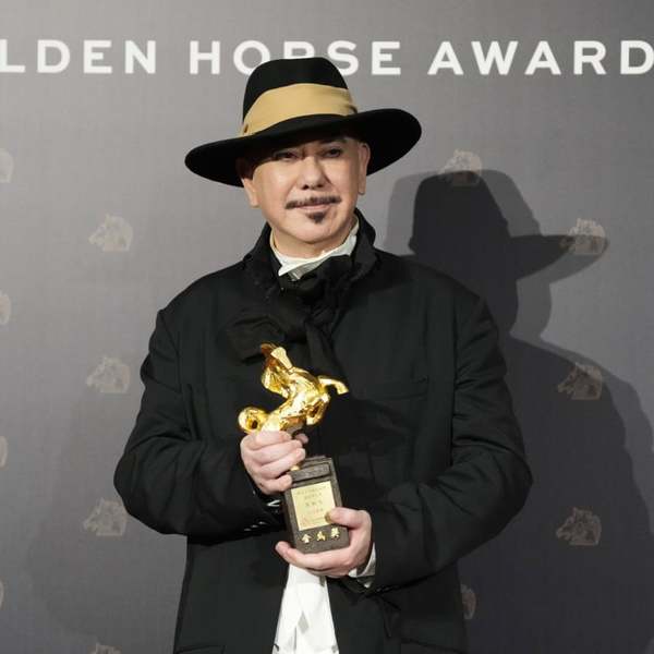 Anthony Wong holding his Best Leading Actor trophy at the Golden Horse Awards.