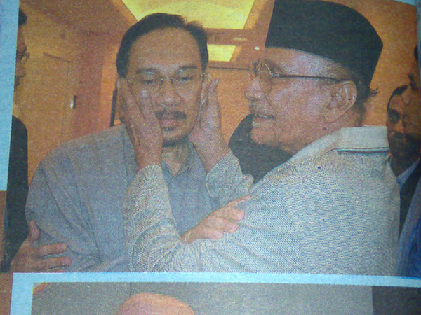 Anwar (left) and his father, Datuk Ibrahim Abdul Rahman.