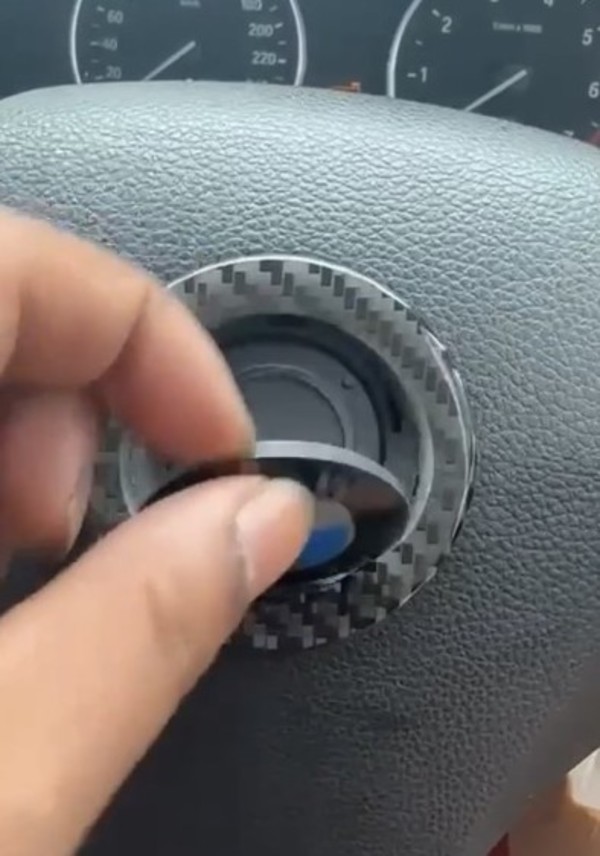 The logo on the BMW's steering came off.