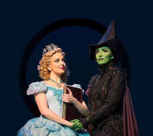 Glinda the Good Witch, played by Talia Suskauer, and Elphaba the Wicked Witch, played by Brittney Johnson, in the New York Broadway musical.