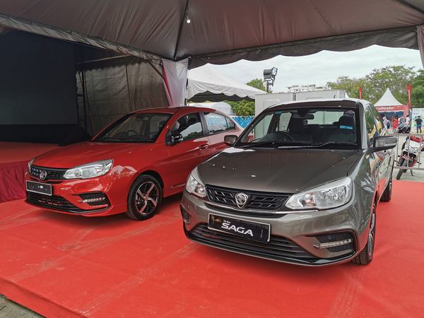 The two Proton Saga prizes for the lucky draw.