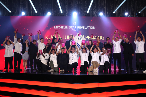 The Bib Gourmand winners posing with their awards at the ceremony.