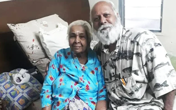 Sandramadi Adaikan, 91, and her son Maheswaran Kandasamy, 62.