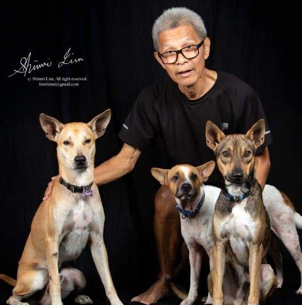 The victim with his three dogs.