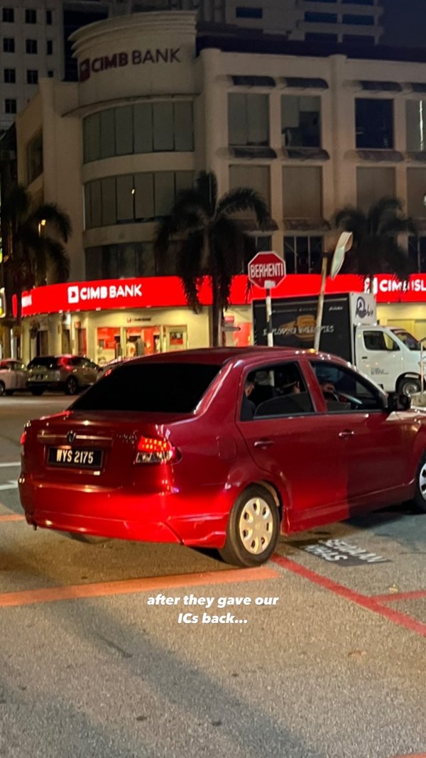 The red Proton the three men were driving.