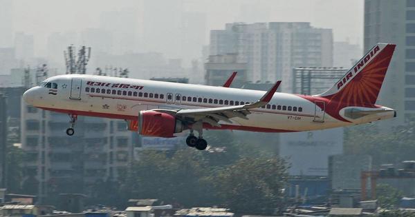 File photo of an Air India flight in the sky immediately after taking off. Residential buildings are visible in the background.