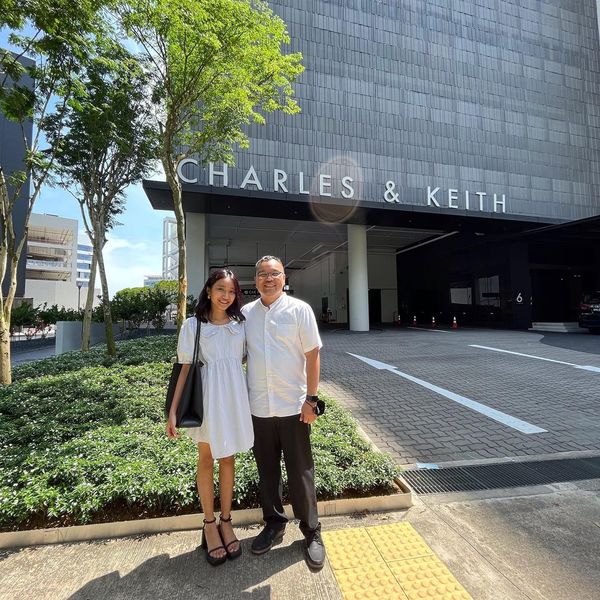 Zoe with her father at the Charles and Keith headquarters in Singapore.