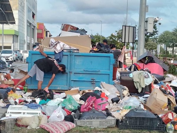 People taking recycling items at the BDC recycling centre.