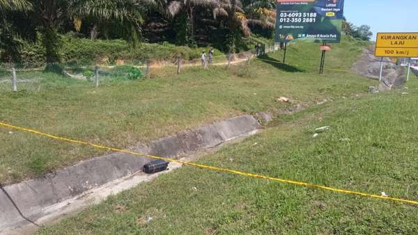 The victim's severed body parts were hidden inside the suitcase before it was dumped along the expressway.