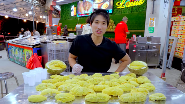 Neo at the Lexus Durian King fruit store in Singapore.