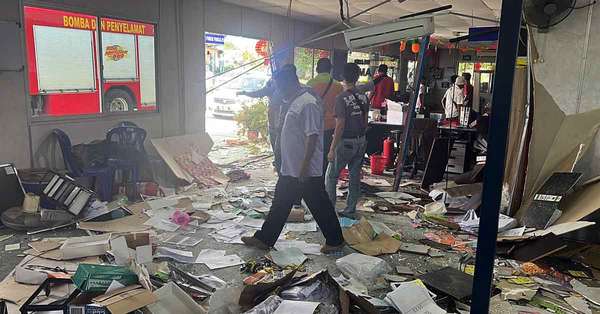 The destroyed administration office after the student driver crashed into the building.