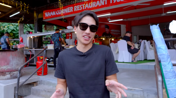 Neo outside Naan Corner Restaurant in Ampang, Selangor, the eatery that hosted the professional eater and his team for the challenge.