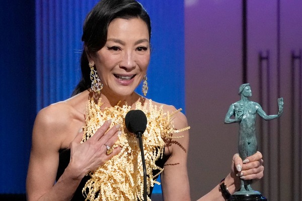 Yeoh accepting her SAG Award for Outstanding Performance by a Female Actress in a Lead Role.