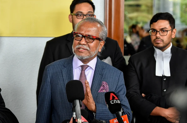 Lawyer Tan Sri Muhammad Shafee Abdullah speaking at a press conference after the proceedings today.