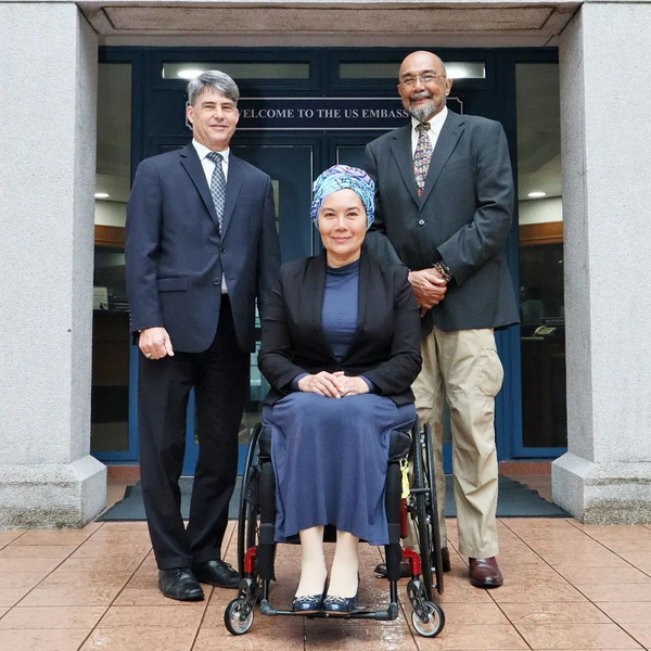 Ras Adiba (centre) at the US Embassy in Kuala Lumpur.