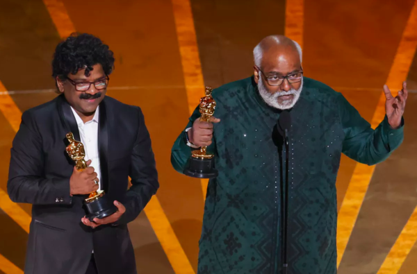 M M Keeravaani and Chandrabose accept the award for Original Song at the 95th Academy Awards.