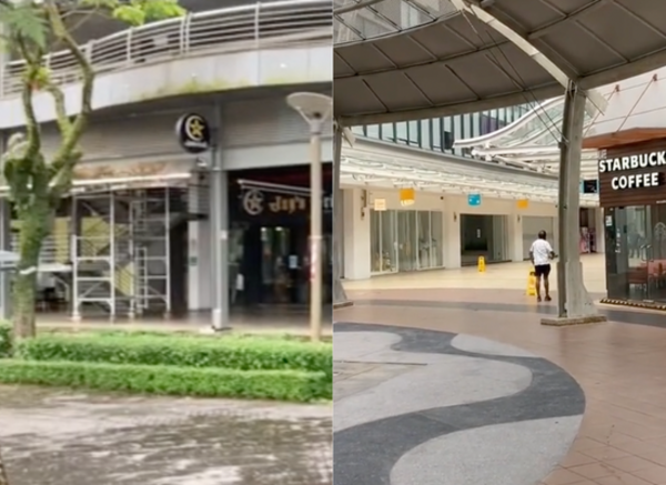 The man showing the surrounding area of the mall, which only has one Starbucks outlet open.