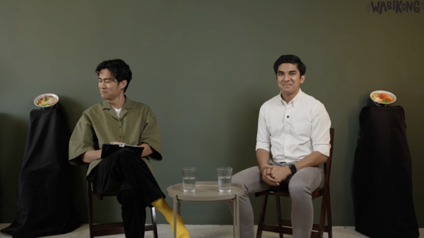 Syed Saddiq Syed Abdul Rahman (right) and Sai trying to repress their laughter.