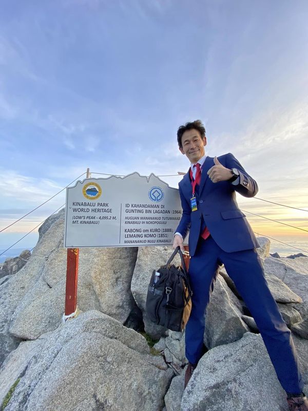 Sada at the peak of Mount Kinabalu.