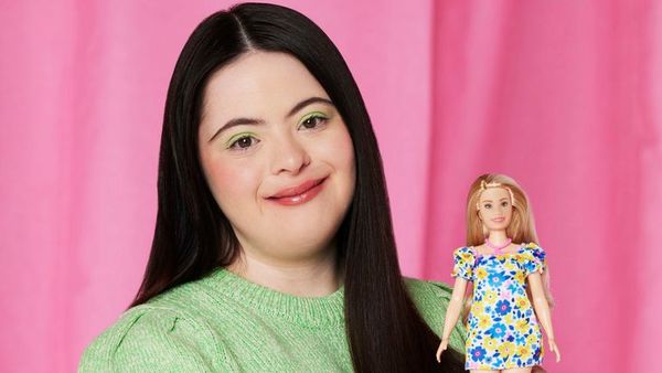 British model Ellie Goldstein with Barbie's first doll representing someone with Down syndrome.