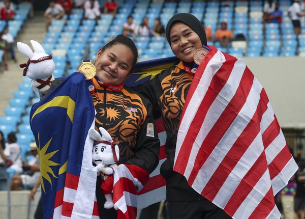 Grace Wong Xiu Mei (left) and Nurul Hidayah Lukman (right).