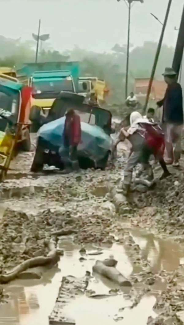 Sunken vehicles as seen in the background of the Instagram video.