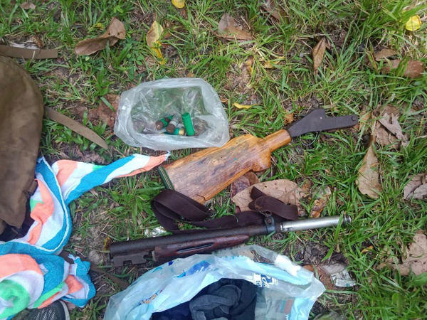 The police seized the homemade shotgun, a shell casing, and four cartridges found at the scene.