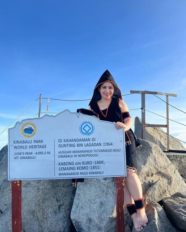 Sheryll in the traditional Dusun Kimaragang attire at Low's Peak, Mount Kinabalu.