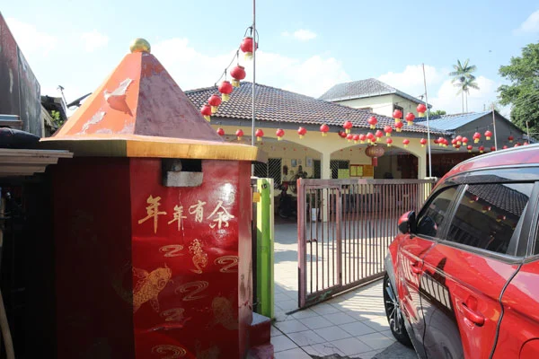 The suspect's house, which also doubles as a neighbourhood temple.